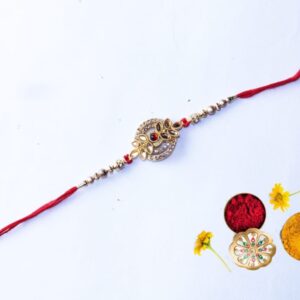 SUMEH Designer Metal Rakhi For Bhaiya & Bhabhi ( 1 Pc Rakhi, 1Pc Roli, 1Pc Chawal)